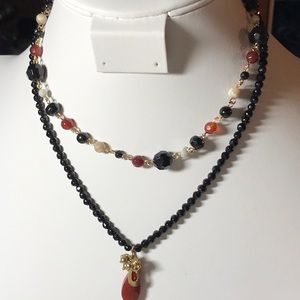 black, cream and red beaded 2 strand necklace